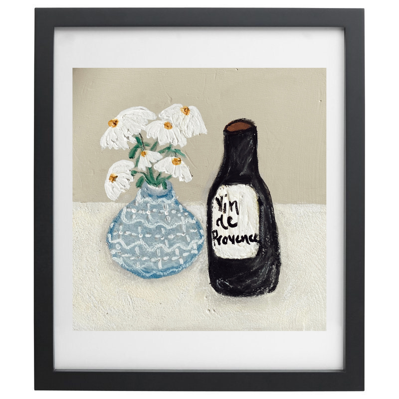 Bottle of wine and vase of flowers artwork with a black frame