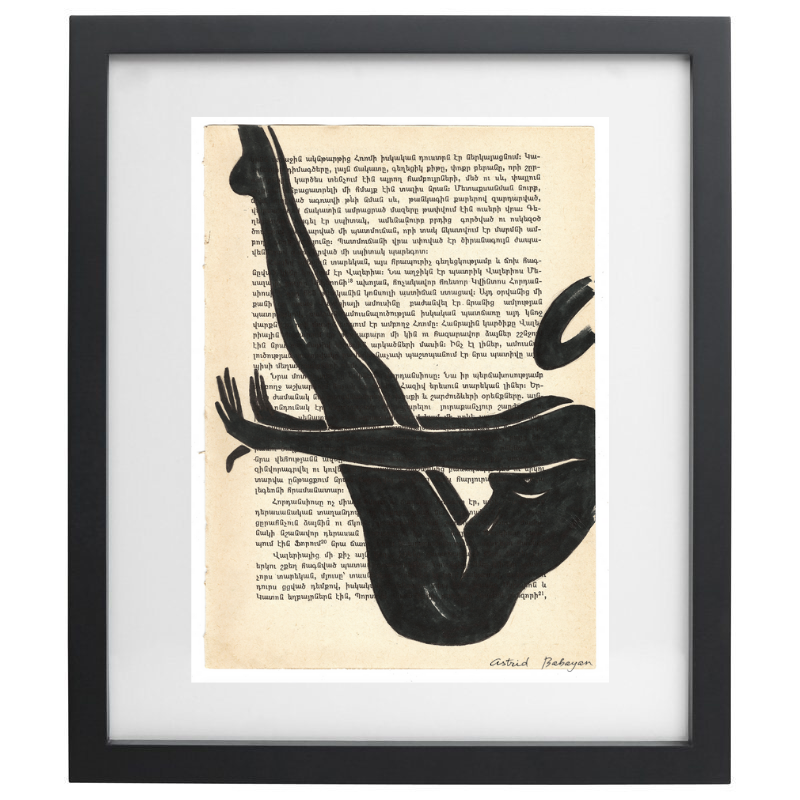 Minimalist artwork of a female form on top of a page of a book in a black frame