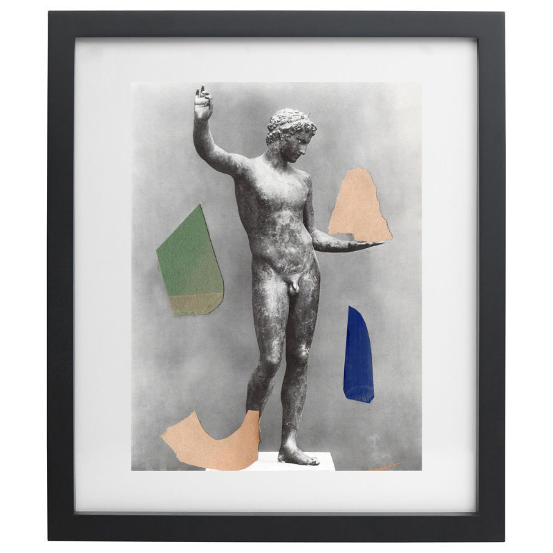 Statue with shapes artwork in a black frame