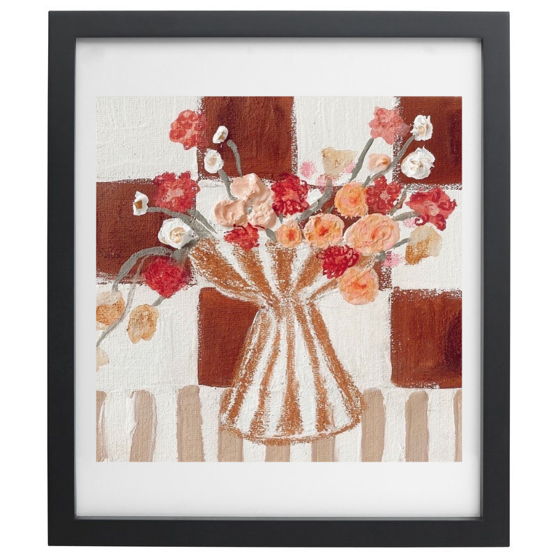 Artwork of a striped vase with flowers over a checkered background in a black frame