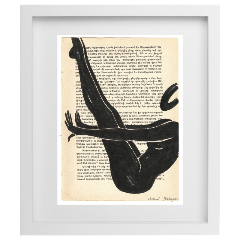 Minimalist artwork of a female form on top of a page of a book in a white frame