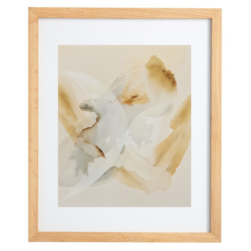 Neutral abstract artwork in a black frame