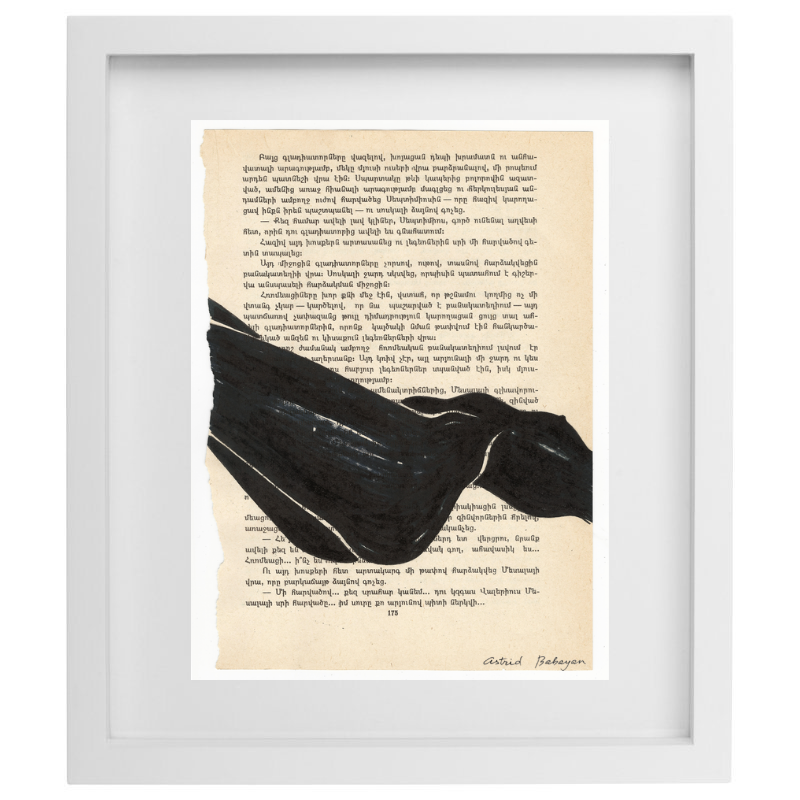 Minimalist artwork of a female form on top of a page of a book in a white frame