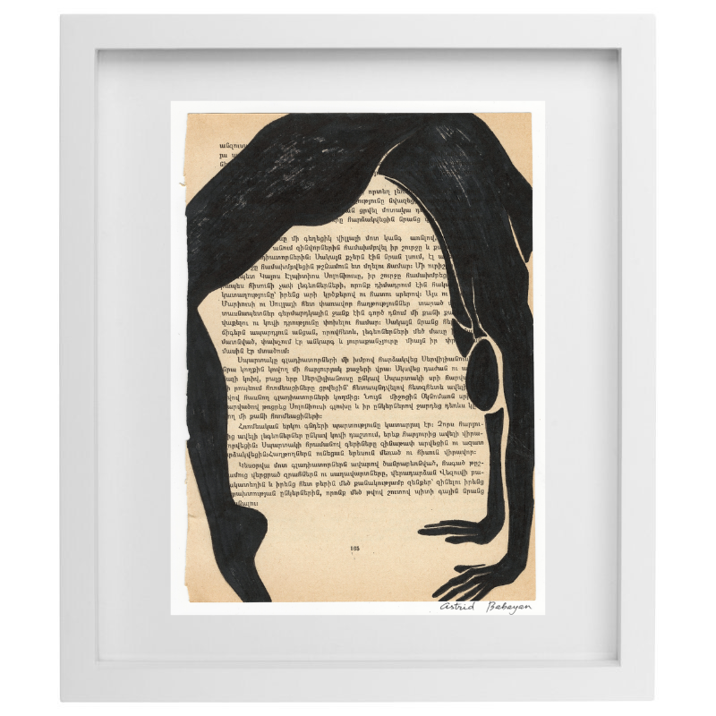 Minimalist artwork of a female form on top of a page of a book in a white frame