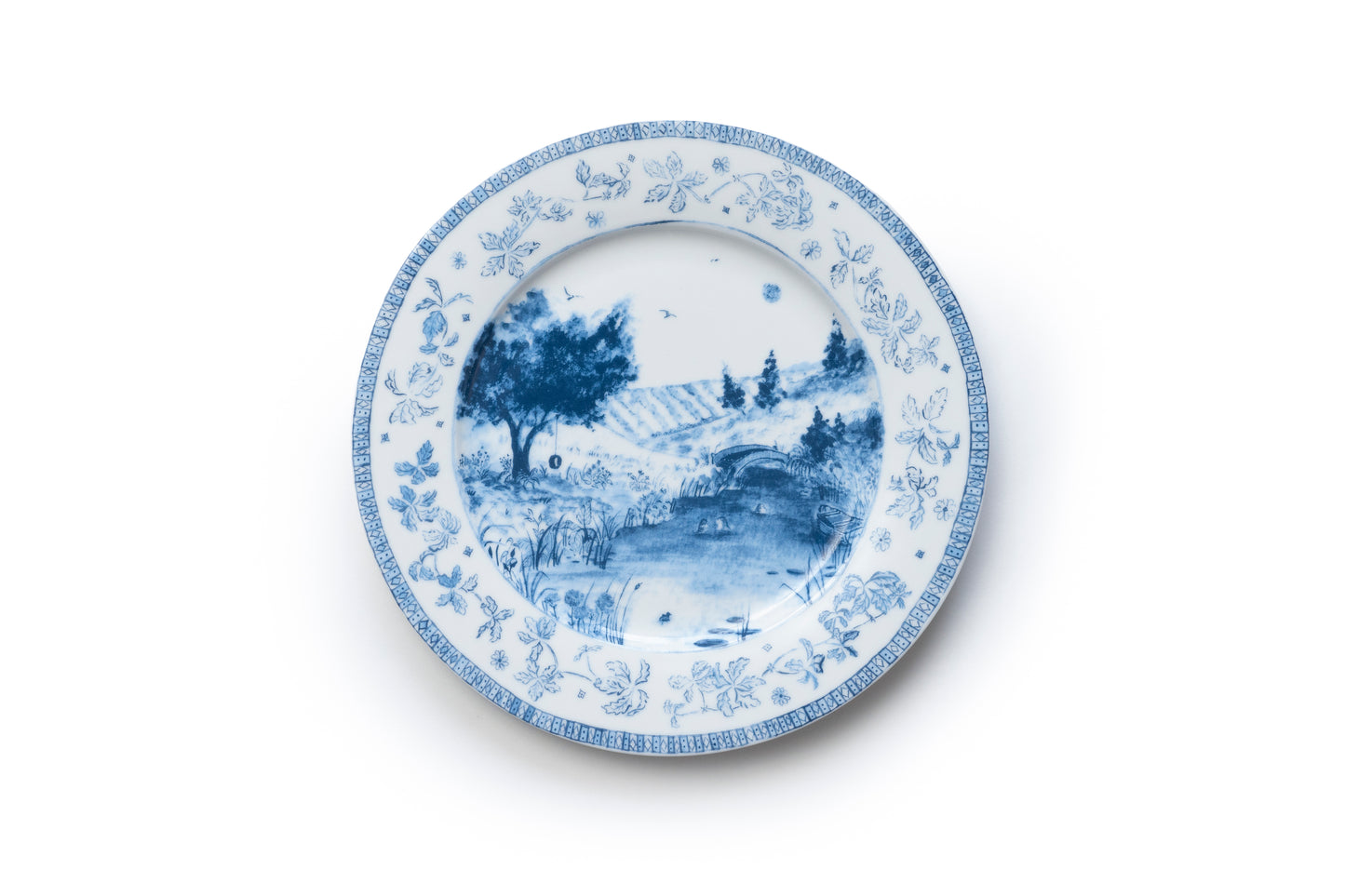 Blue and white porcelain plate with nature elements