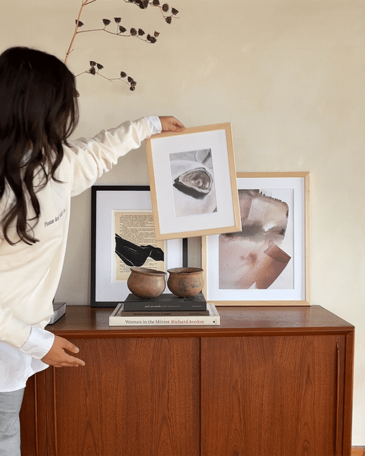 Realistic oyster artwork in neutral colours pictured leaning against the wall