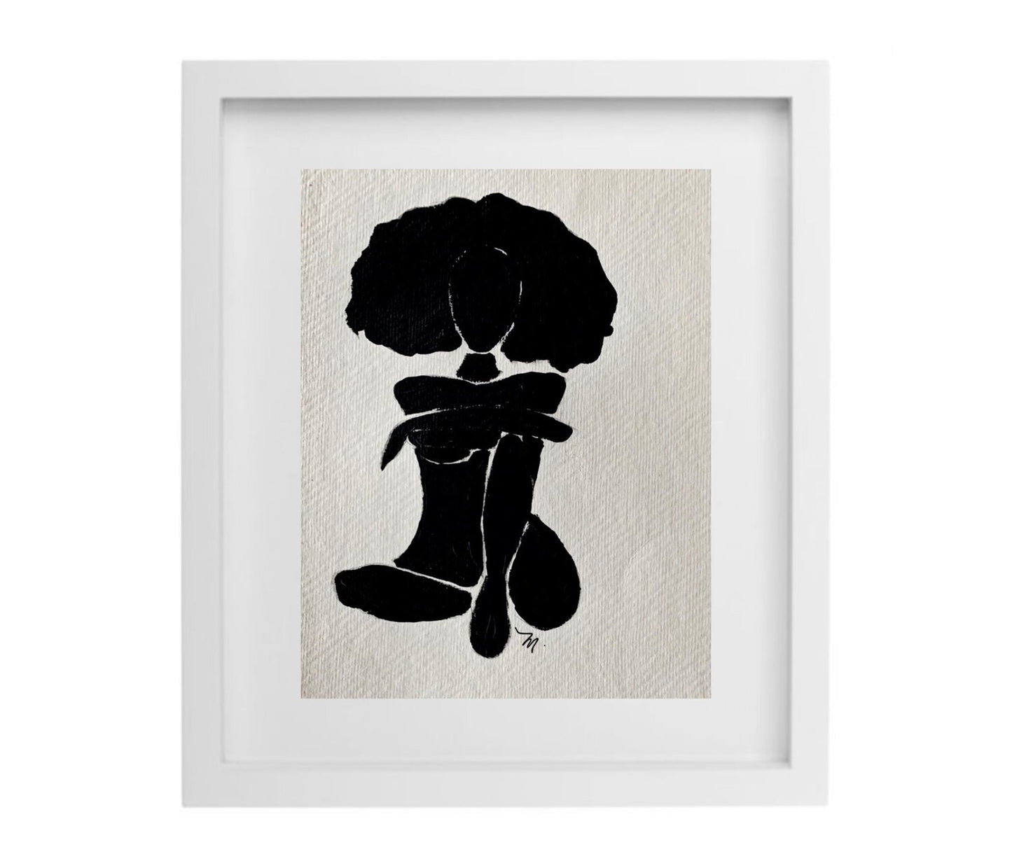 Black and white female figure artwork in a white frame