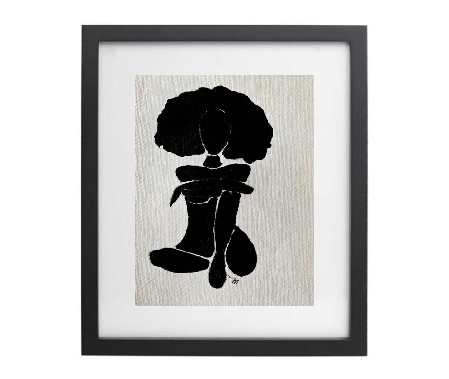 Black and white female figure artwork in a black frame