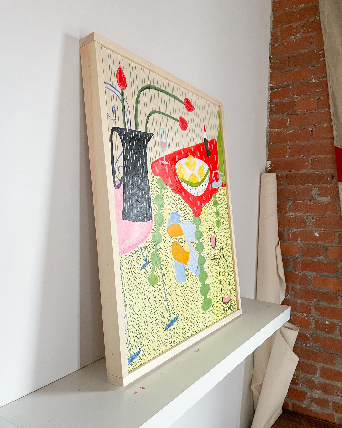 Abstract colourful still life artwork pictured leaning against the wall from a diagonal