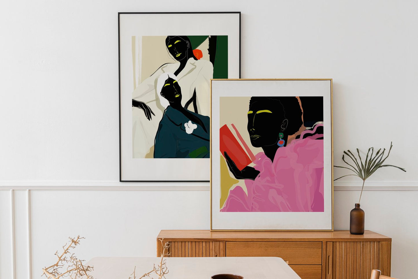 Woman in a pink outfit colour blocked artwork pictured on the wall