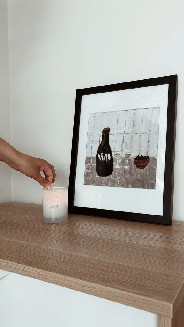 Abstract wine and grapes artwork pictured leaning against the wall