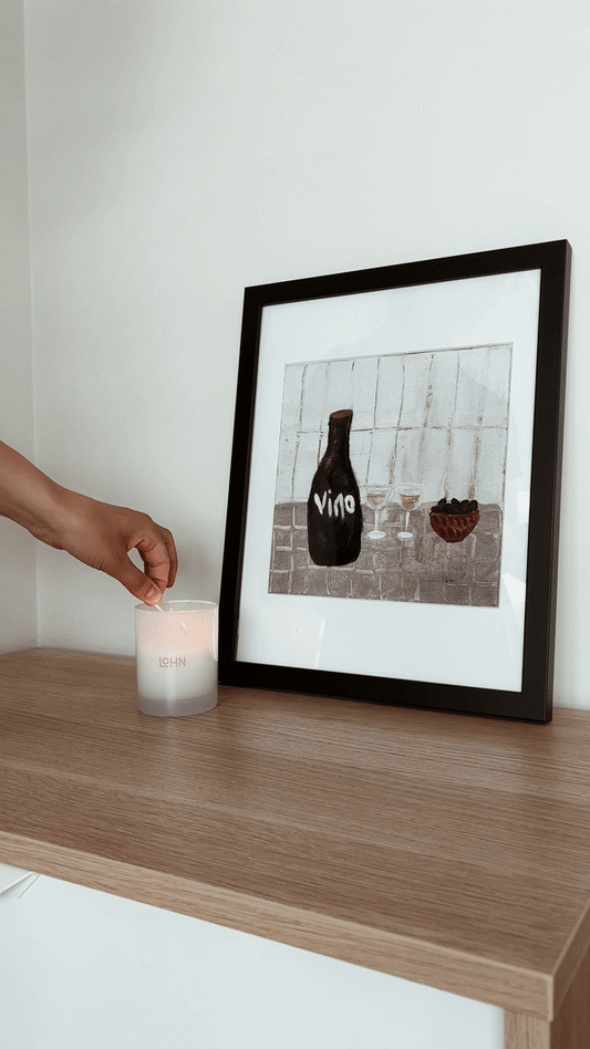 Abstract wine and grapes artwork pictured leaning against the wall