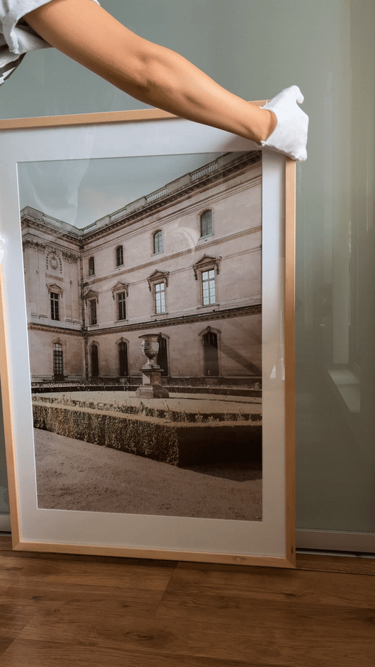 Paris photography pictured leaning against a wall