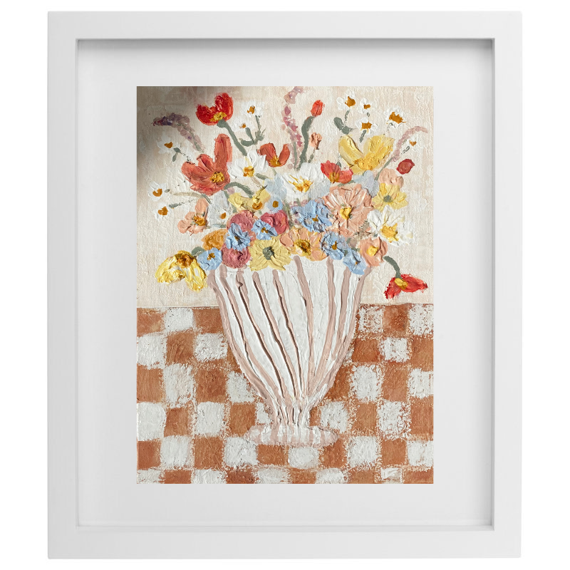 Abstract striped vase with flowers on a checkered table in a white frame