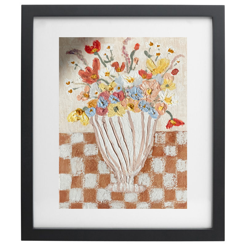Abstract striped vase with flowers on a checkered table in a black frame