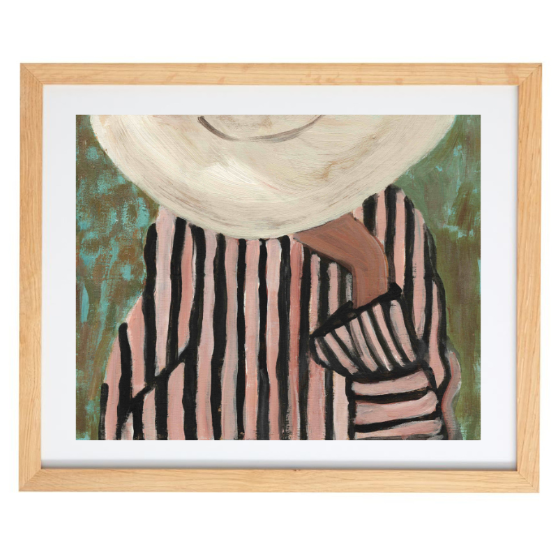 Person in a striped outfit and sunhat artwork in a natural frame