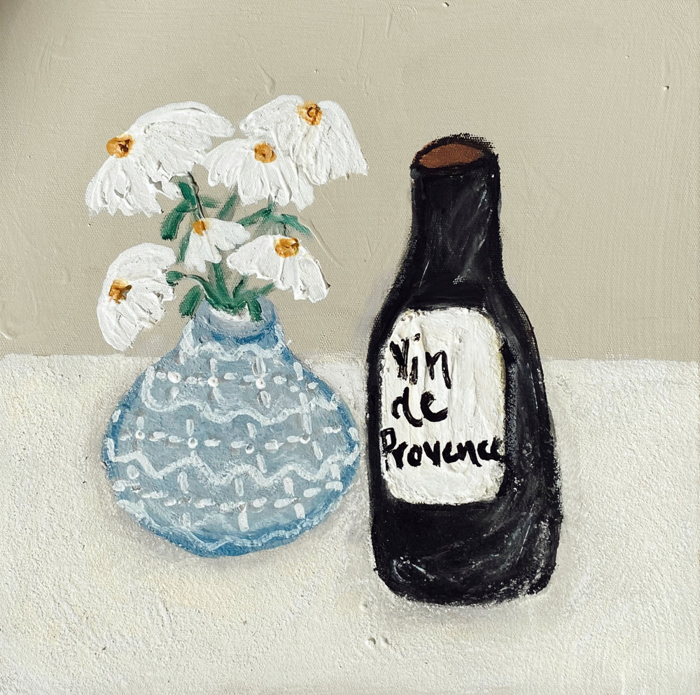 Bottle of wine and vase of flowers artwork