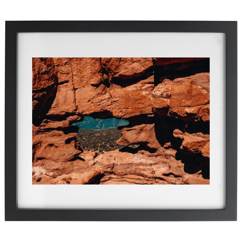 Orange rock photography in a black frame