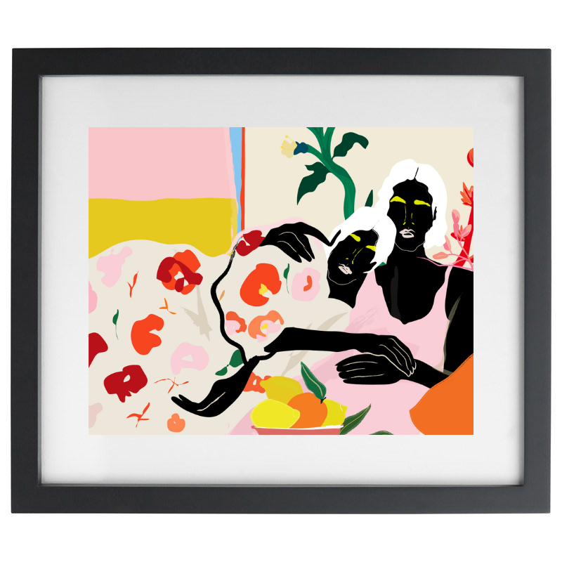 Two women cuddling colour blocked artwork in a black frame