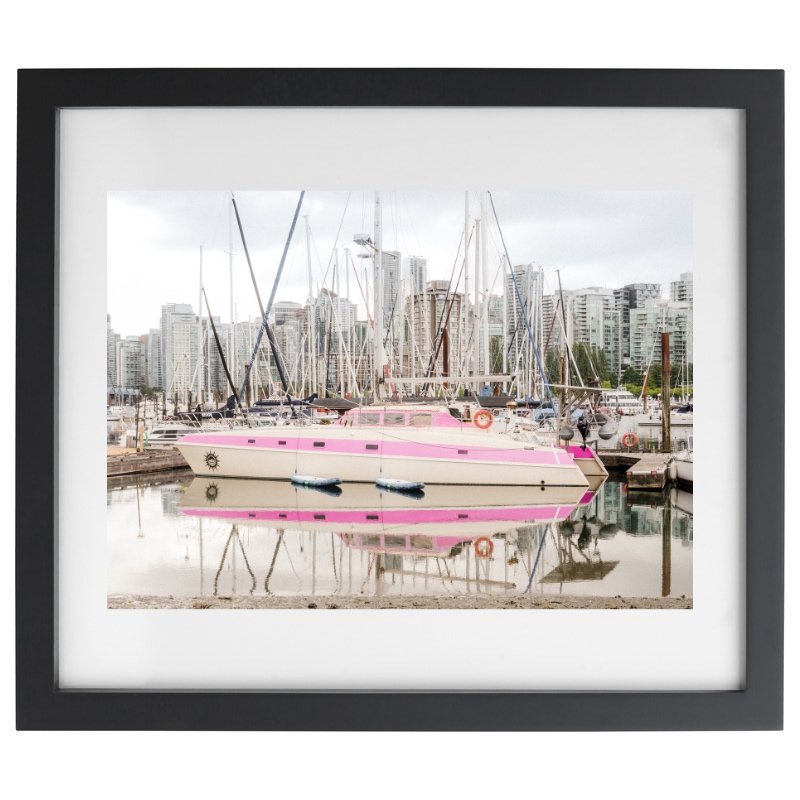 Pink houseboat photography in a black frame