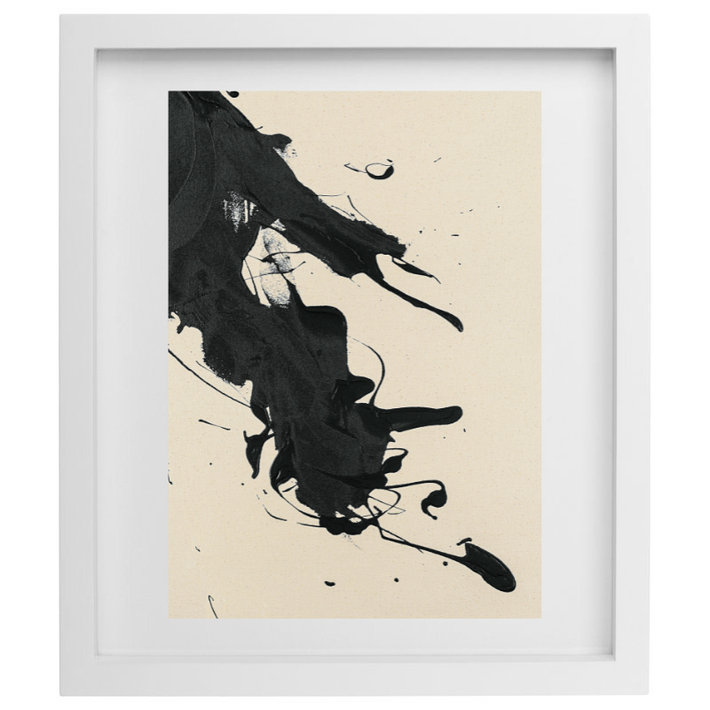 Abstract black paint splatter artwork in a white frame
