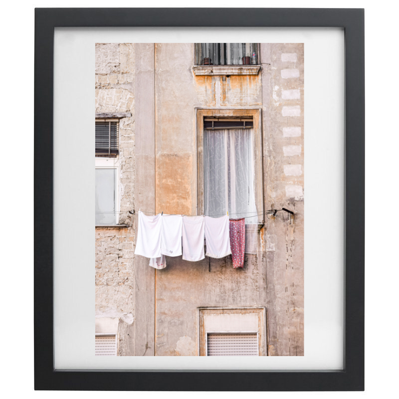 Laundry drying in Naples photography in a black frame 