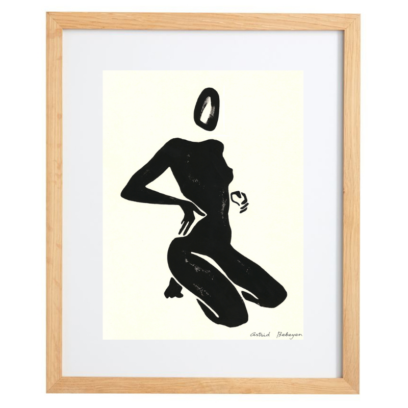 Minimalist female figure in black and white in a natural frame