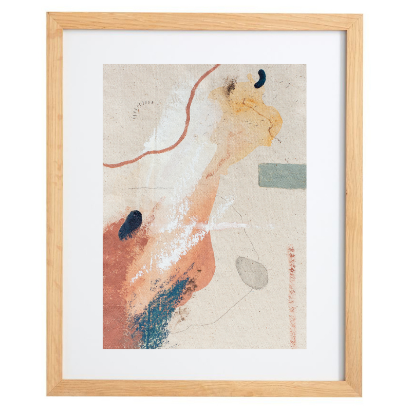 Abstract orange and blue artwork in a natural frame
