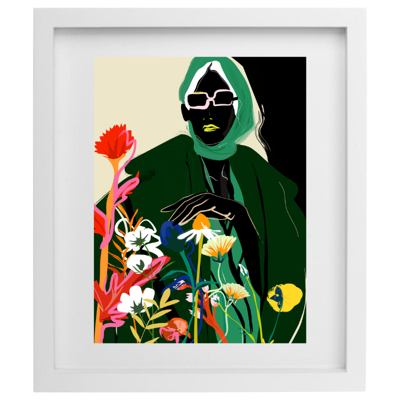 Woman in a green outfit with florals artwork in a white frame 
