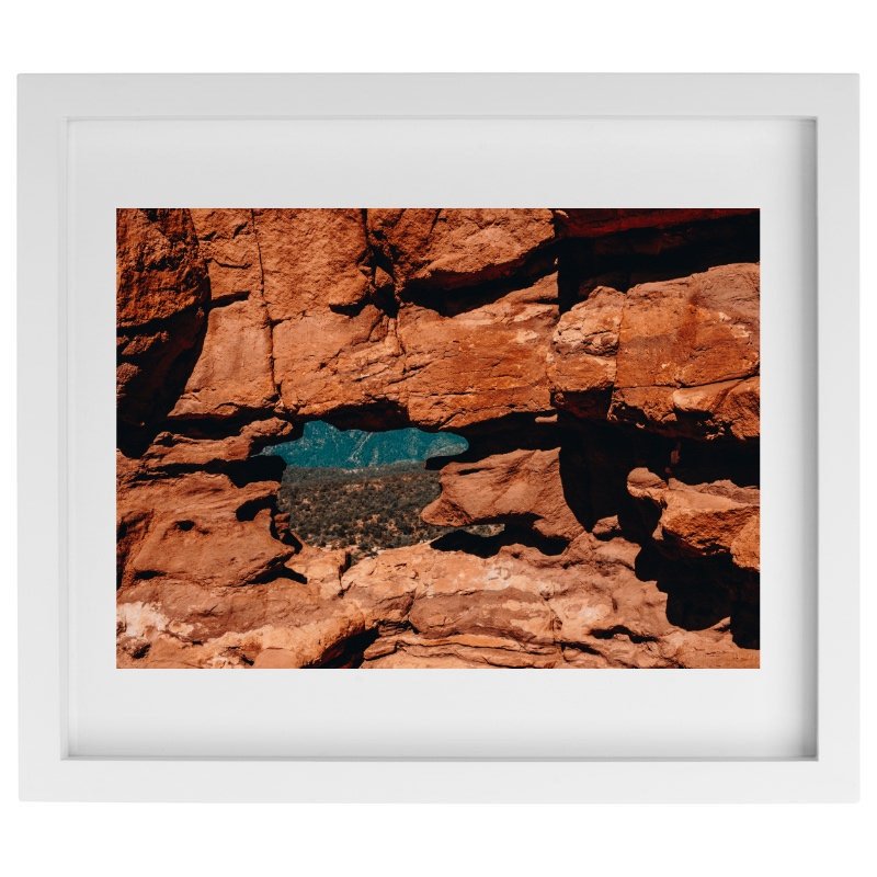 Orange rock photography in a white frame