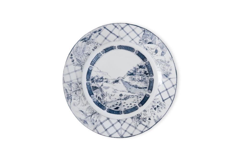Blue and white porcelain plate with nature elements