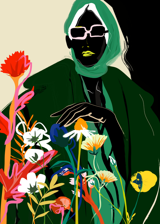 Woman in a green outfit with florals artwork